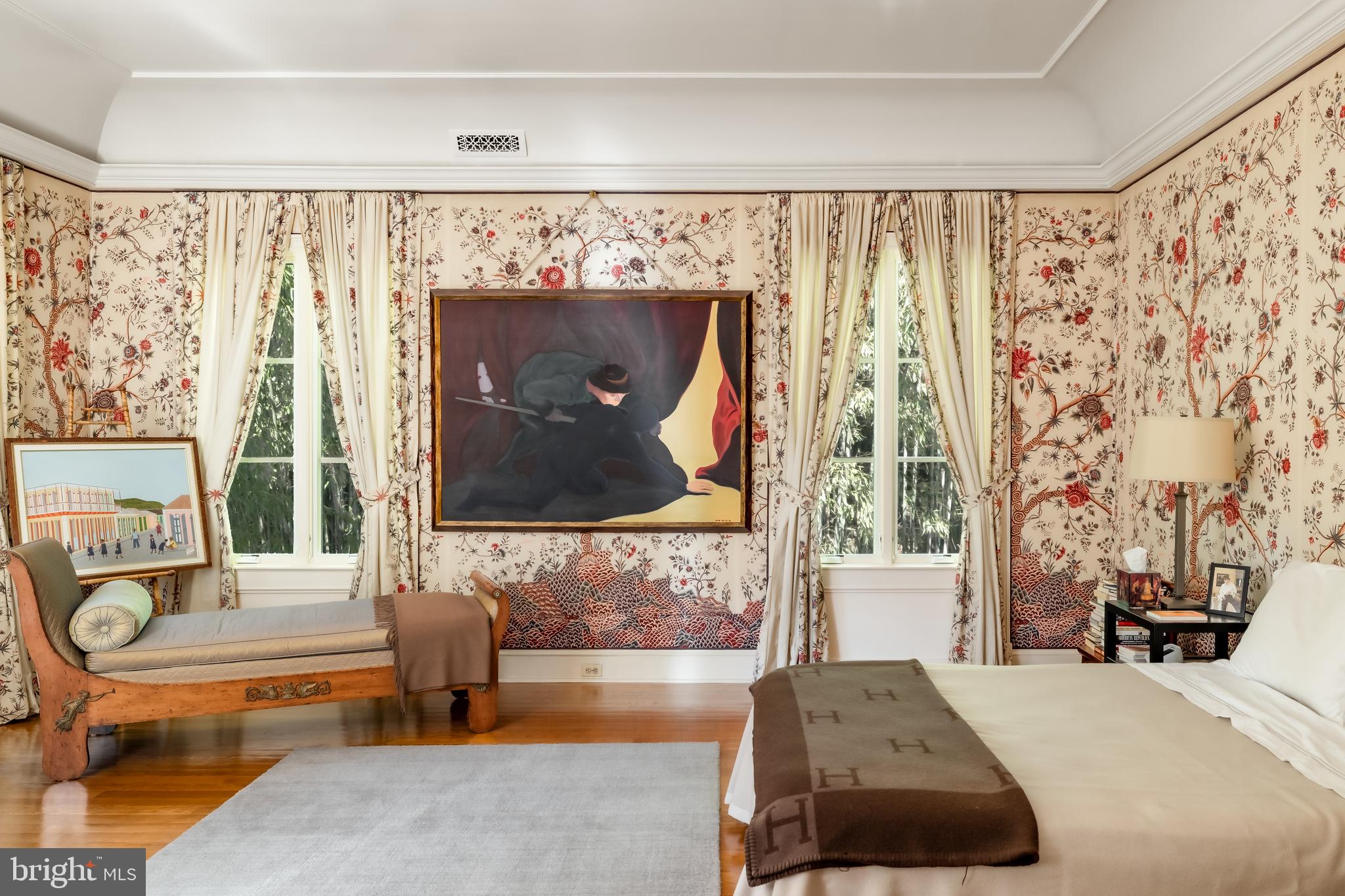 2740 Chain Bridge Road Northwest Washington, DC 20016 - Photo 27 of 50 a living room with a couch and a flat screen tv