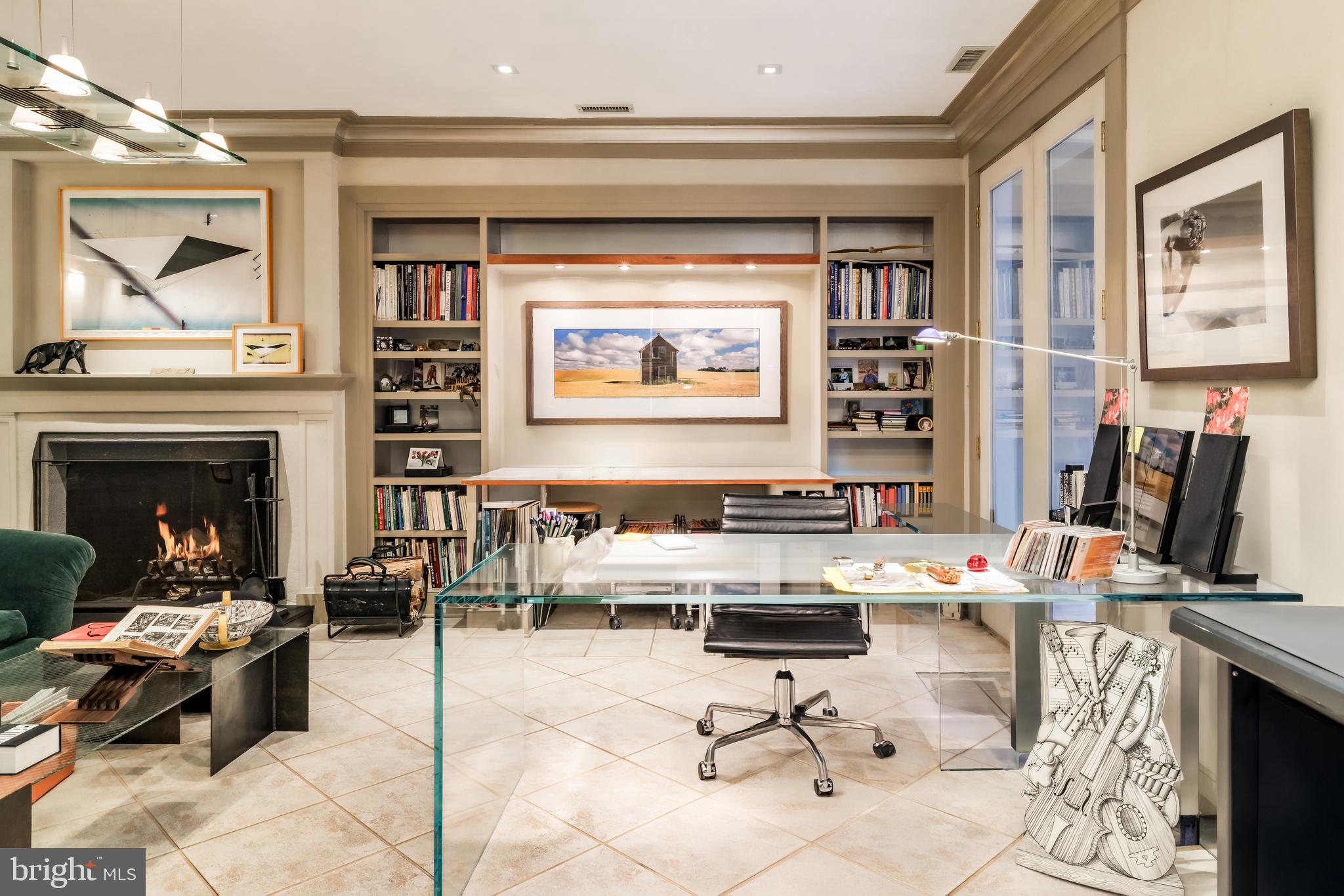 2740 Chain Bridge Road Northwest Washington, DC 20016 - Photo 38 of 50 a living room with furniture and a fireplace