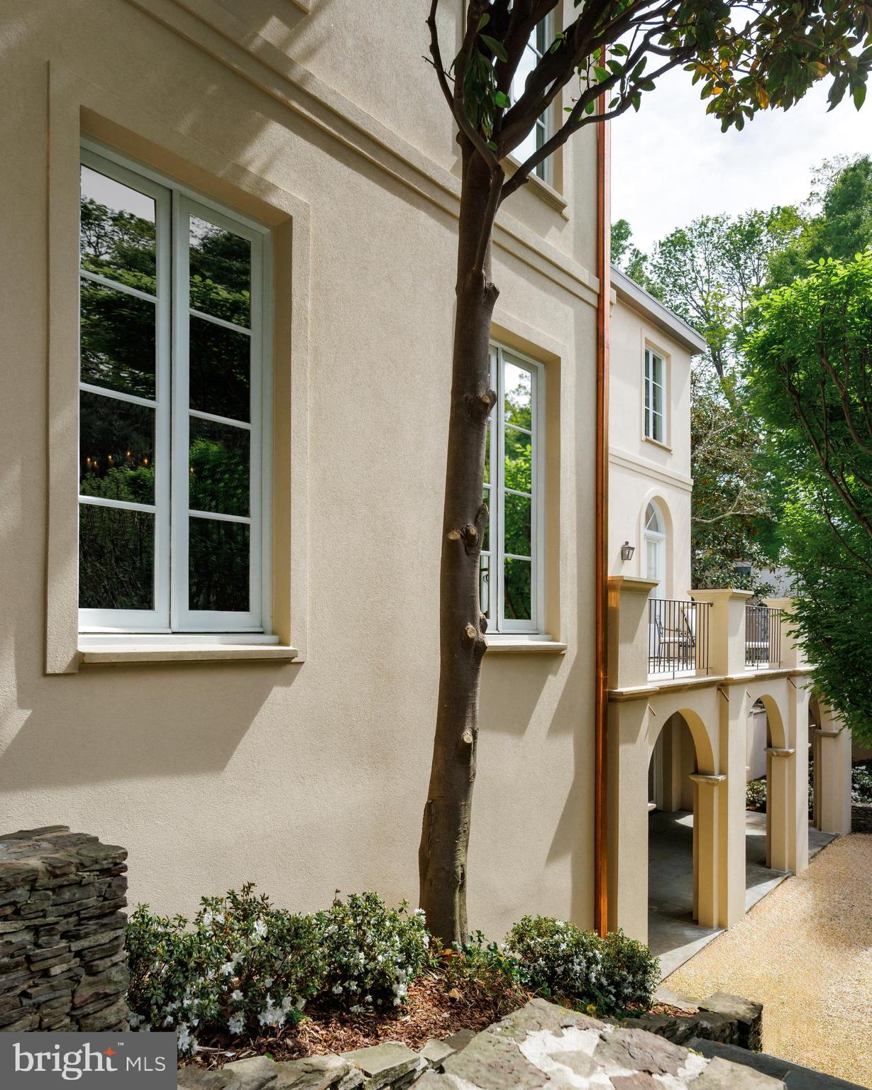 2740 Chain Bridge Road Northwest Washington, DC 20016 - Photo 47 of 50 a front view of a house with a yard