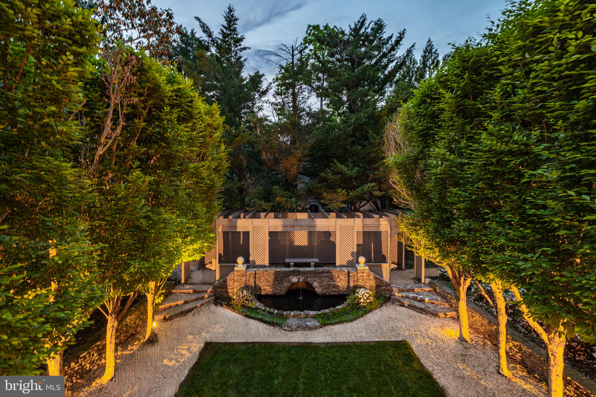 2740 Chain Bridge Road Northwest Washington, DC 20016 - Photo 49 of 50 a view of a backyard with sitting area