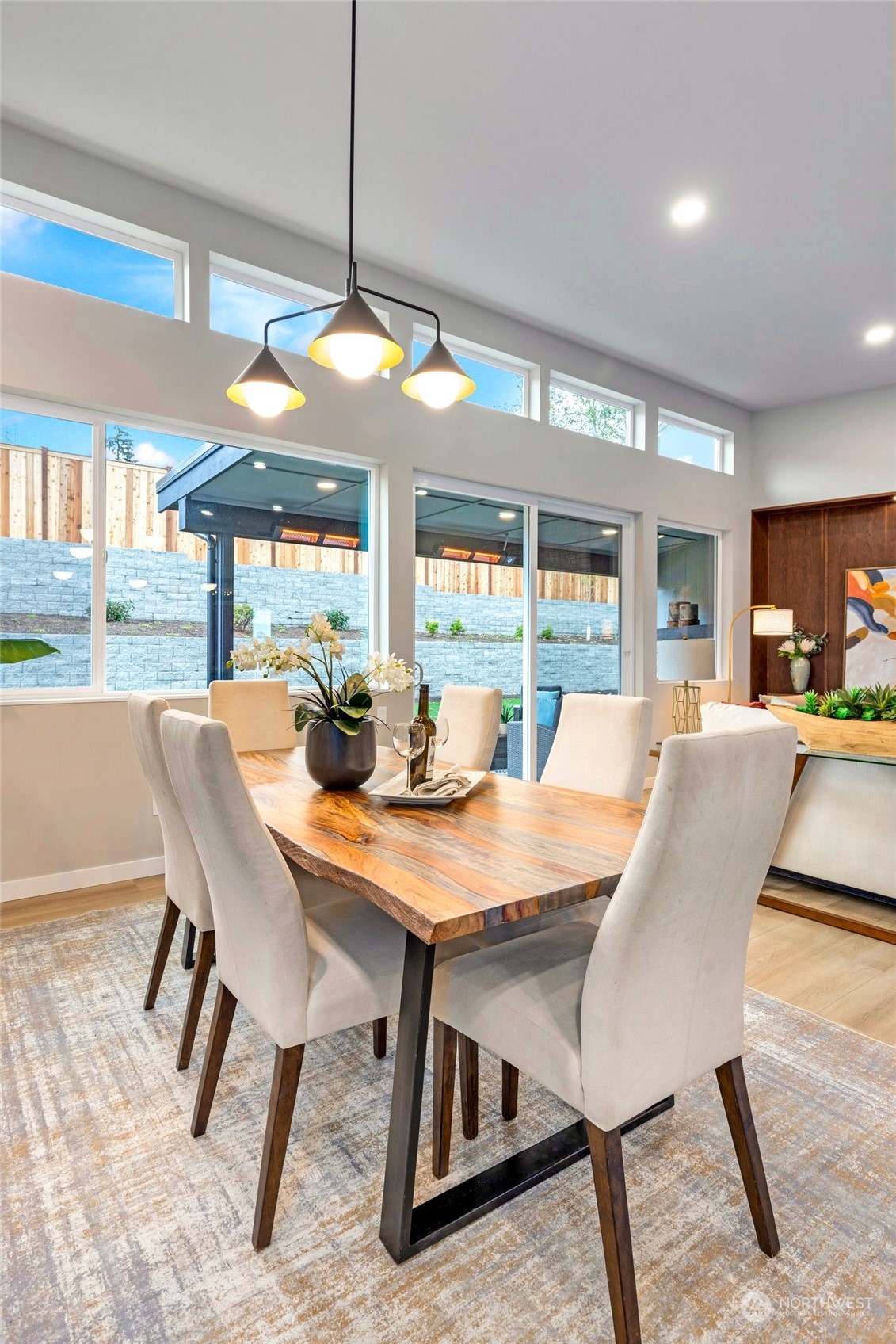 10053 Northeast 196th Place Bothell, WA 98011 - Photo 13 of 40 a view of a dining room with furniture window and wooden floor