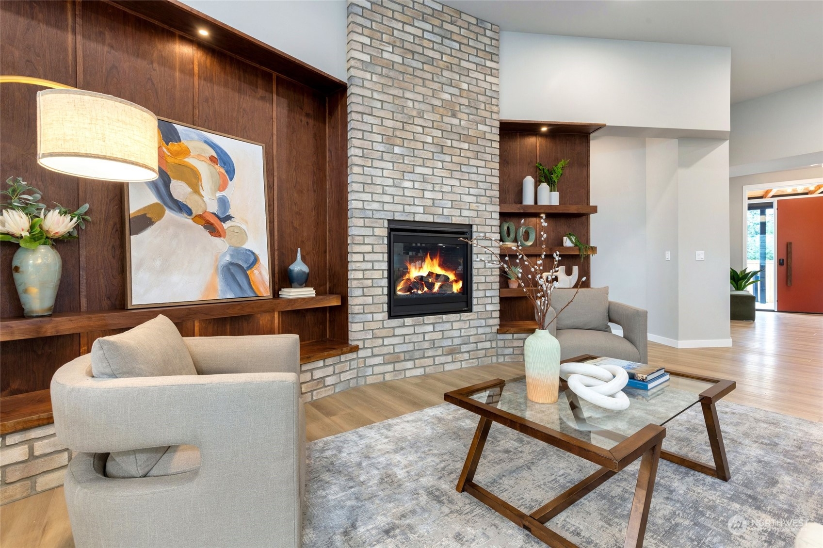 10053 Northeast 196th Place Bothell, WA 98011 - Photo 14 of 40 a living room with furniture a fireplace and a flat screen tv