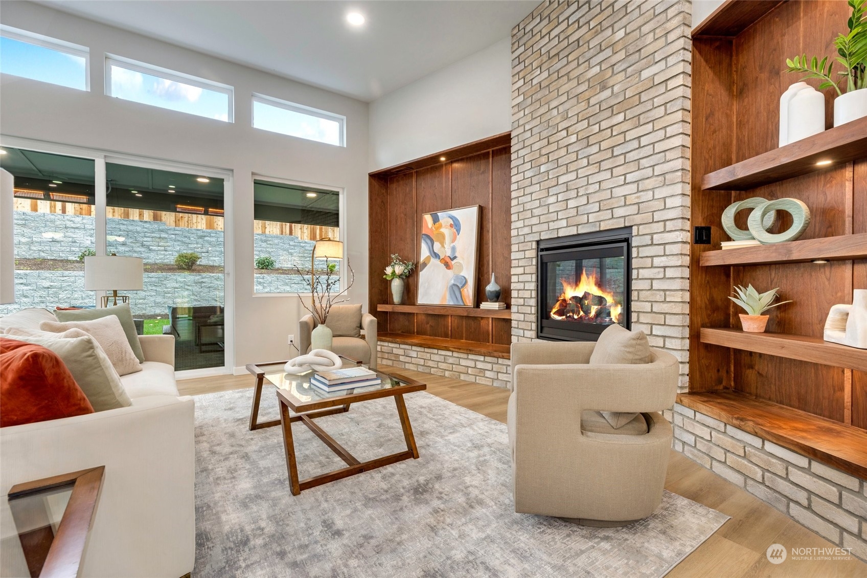 10053 Northeast 196th Place Bothell, WA 98011 - Photo 15 of 40 a living room with furniture and a fireplace