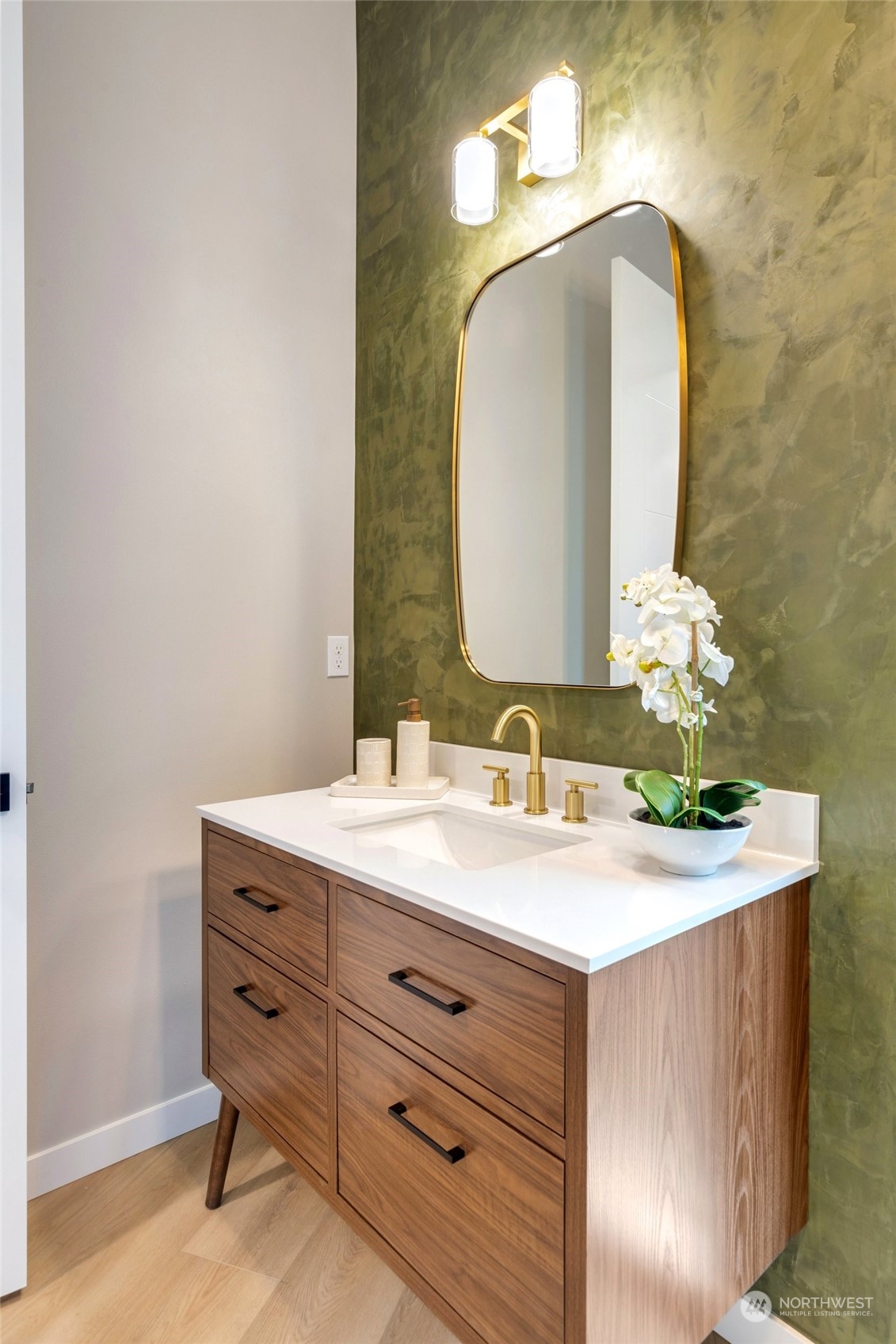 10053 Northeast 196th Place Bothell, WA 98011 - Photo 16 of 40 a bathroom with a sink vanity and a mirror