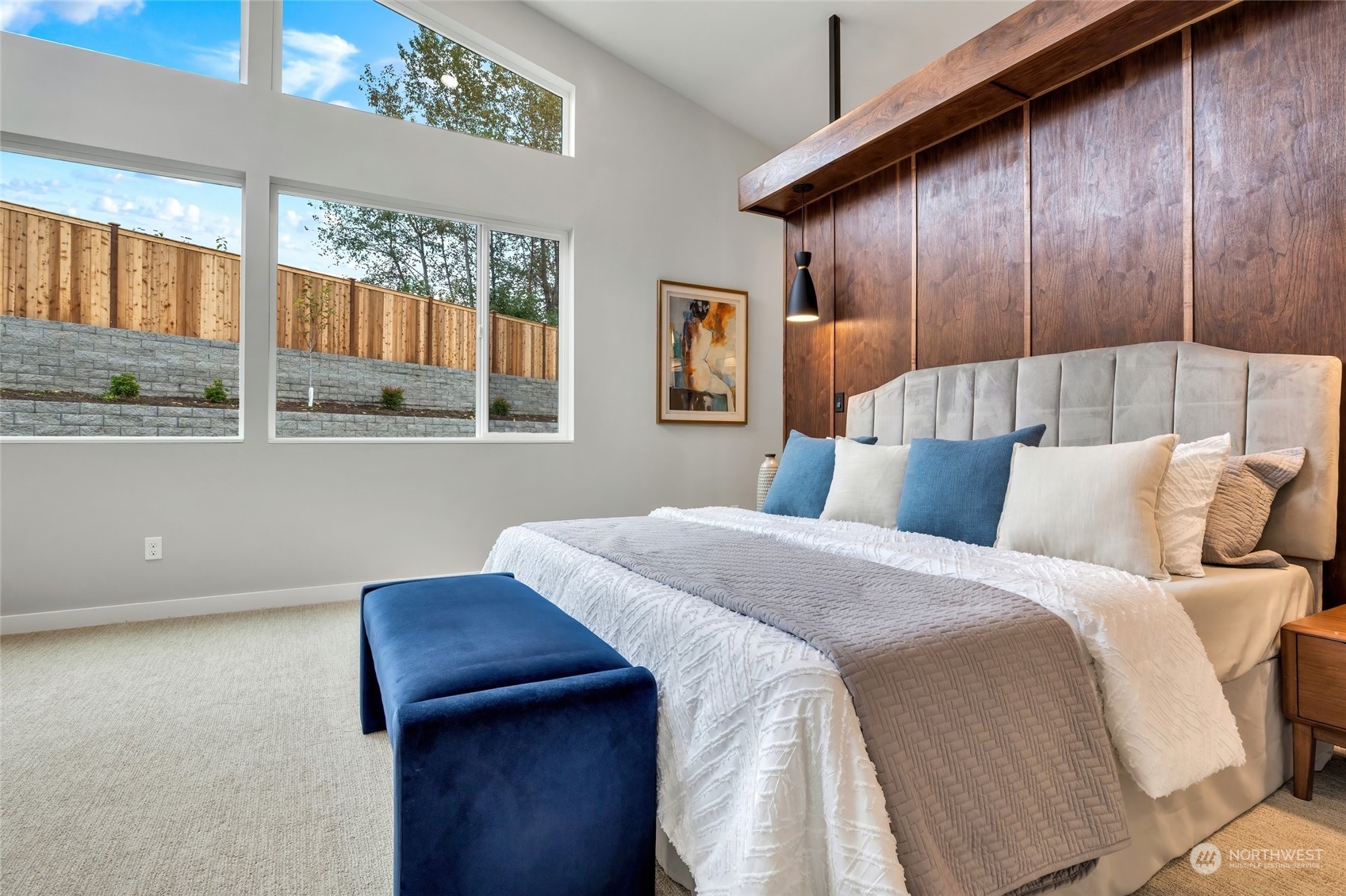 10053 Northeast 196th Place Bothell, WA 98011 - Photo 17 of 40 a bedroom with a bed and wooden floor