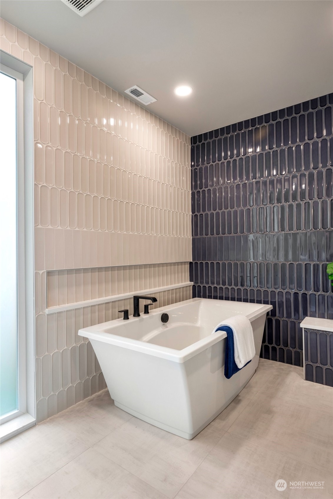 10053 Northeast 196th Place Bothell, WA 98011 - Photo 20 of 40 a bathroom with a bathtub and shower