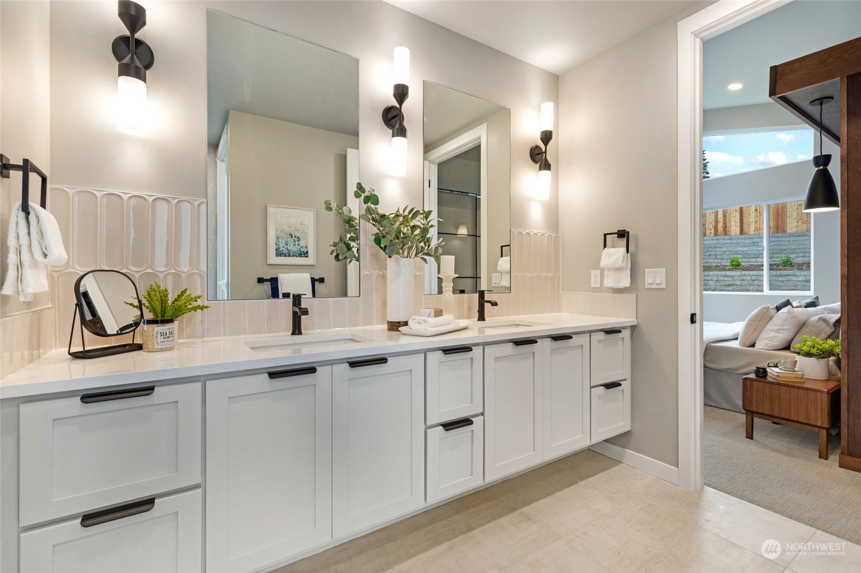 10053 Northeast 196th Place Bothell, WA 98011 - Photo 21 of 40 a bathroom with a sink and a mirror