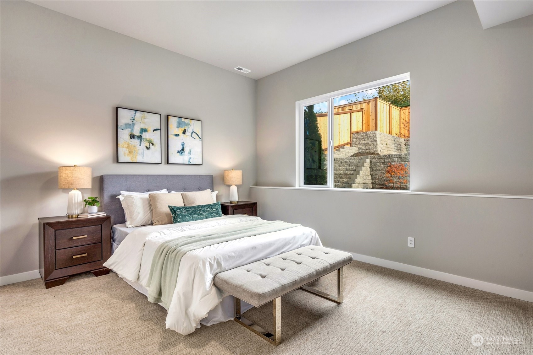 10053 Northeast 196th Place Bothell, WA 98011 - Photo 24 of 40 a bedroom with a bed a lamp and a window
