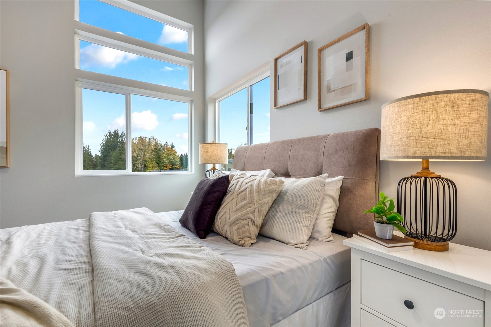 10053 Northeast 196th Place Bothell, WA 98011 - Photo 28 of 40 a bedroom with a bed and a window