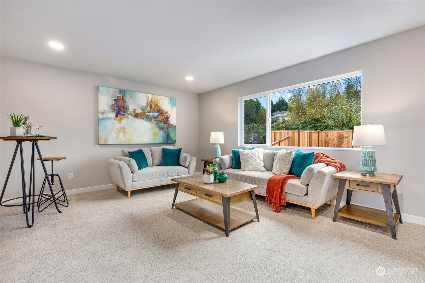 10053 Northeast 196th Place Bothell, WA 98011 - Photo 34 of 40 a living room with furniture and a large window