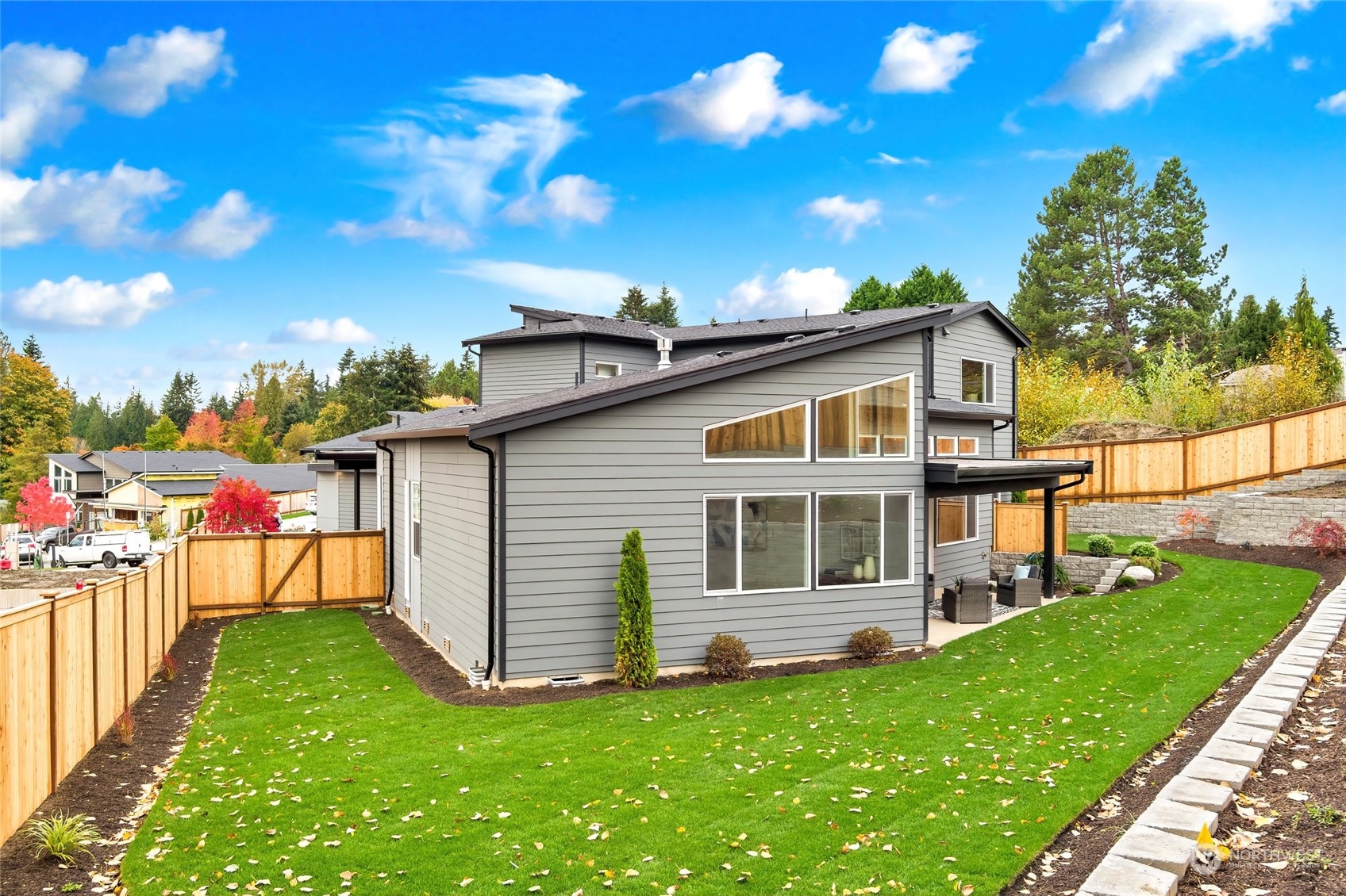 10053 Northeast 196th Place Bothell, WA 98011 - Photo 39 of 40 a front view of a house with a yard