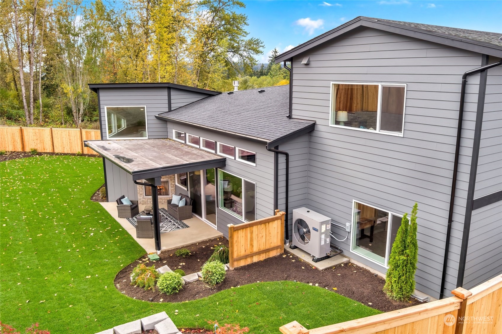 10053 Northeast 196th Place Bothell, WA 98011 - Photo 40 of 40 a view of a house with backyard and porch