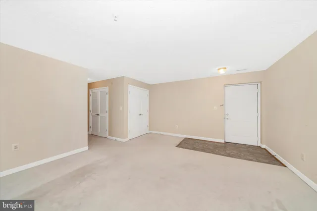 an empty room with an entryway