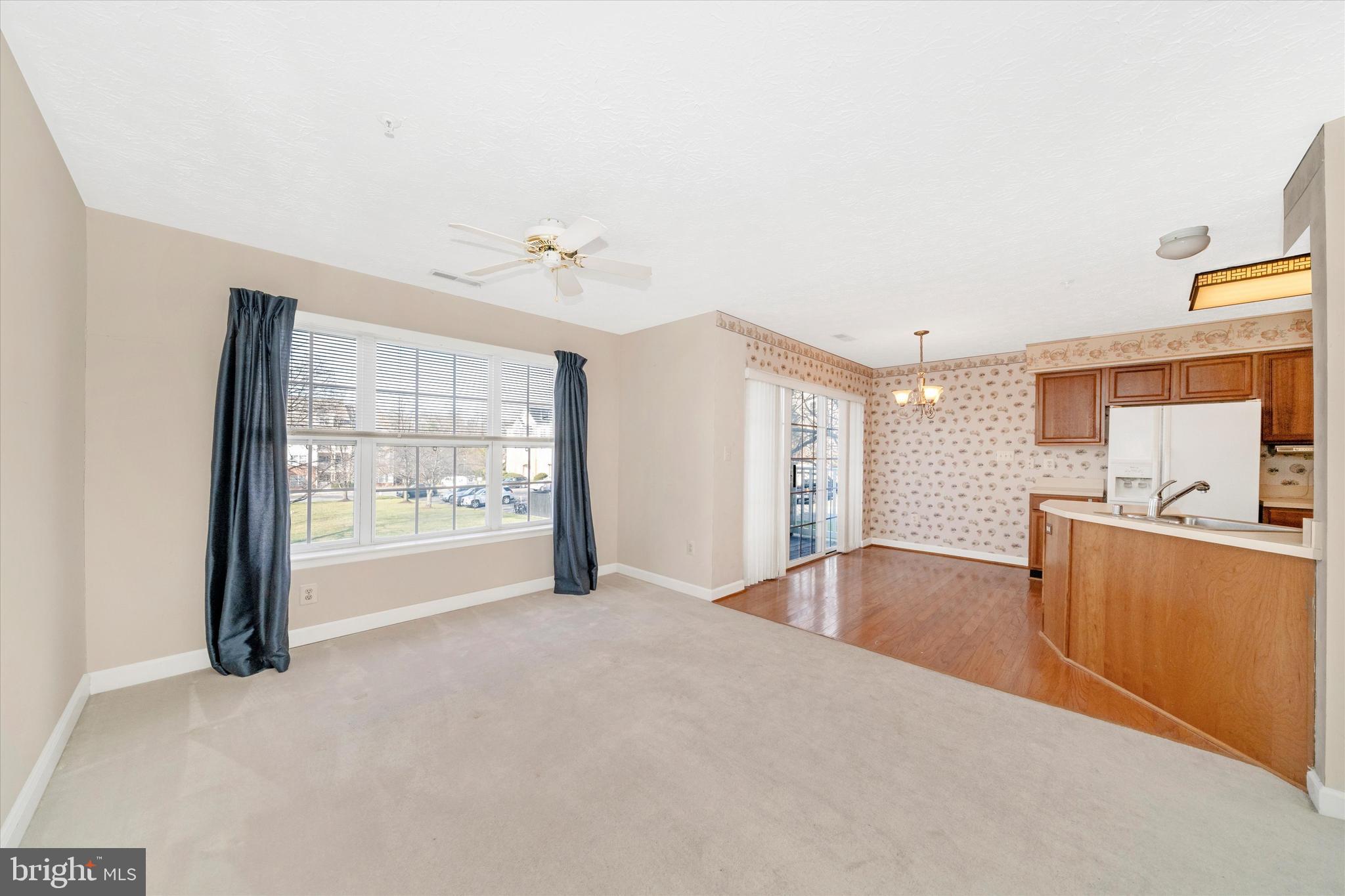 6117 Springwater Place, Unit 1723 Frederick, MD 21701 - Photo 15 of 50 a view of a kitchen with a sink and a large window