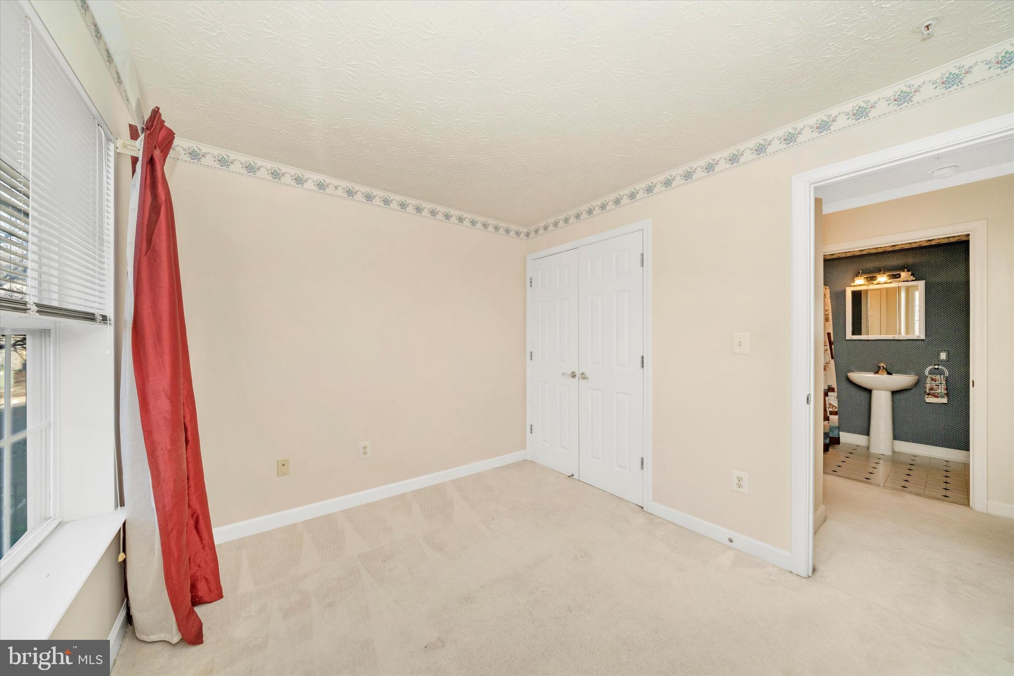 6117 Springwater Place, Unit 1723 Frederick, MD 21701 - Photo 33 of 50 a view of a room with wooden floor and windows