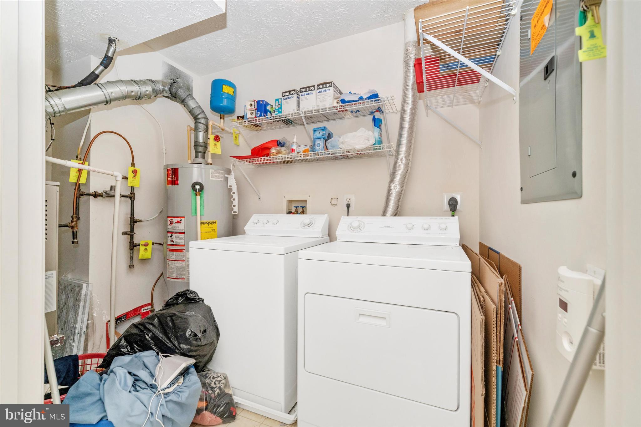 6117 Springwater Place, Unit 1723 Frederick, MD 21701 - Photo 37 of 50 a utility room with dryer and washer