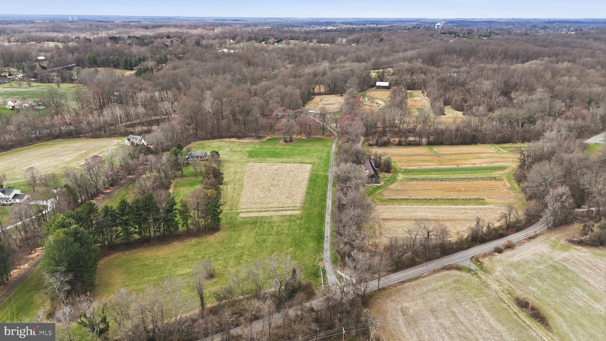 18311 Queen Anne Bridge Road Bowie, MD 20716 - Photo 2 of 46 a view of a yard