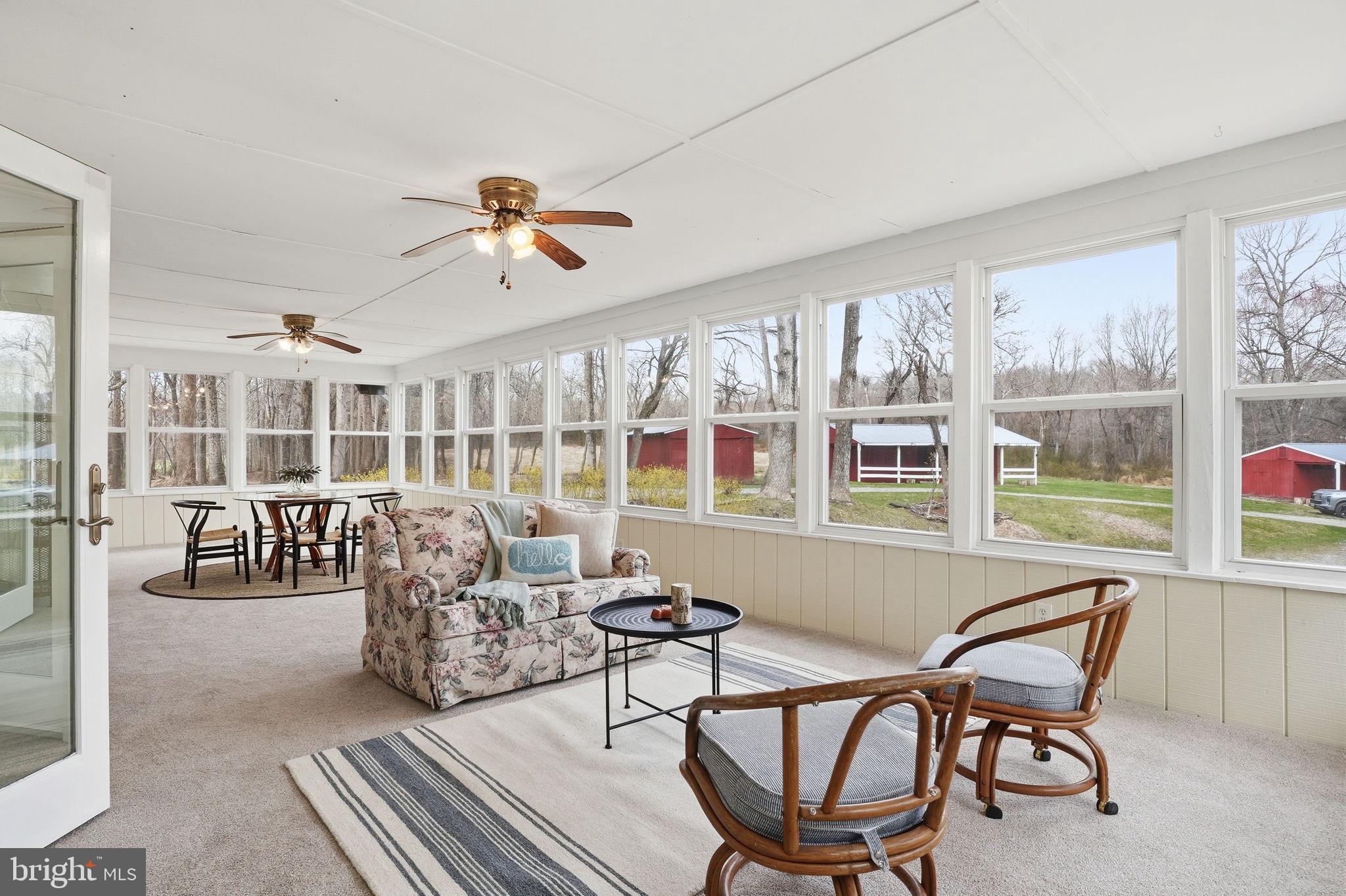 18311 Queen Anne Bridge Road Bowie, MD 20716 - Photo 22 of 46 a living room with furniture and a large window