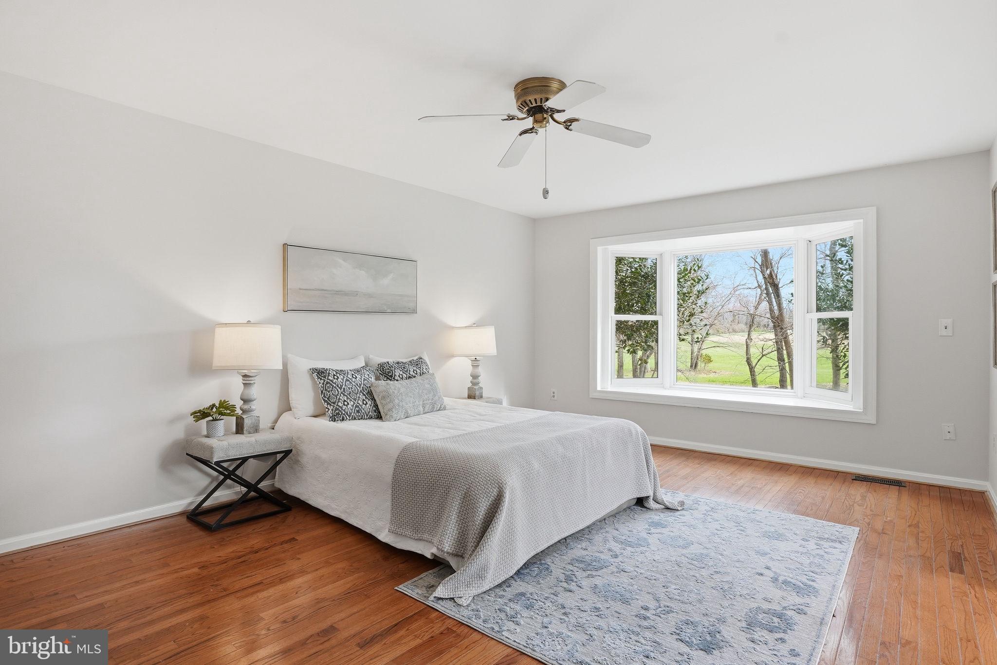 18311 Queen Anne Bridge Road Bowie, MD 20716 - Photo 24 of 46 a bedroom with a bed and a window