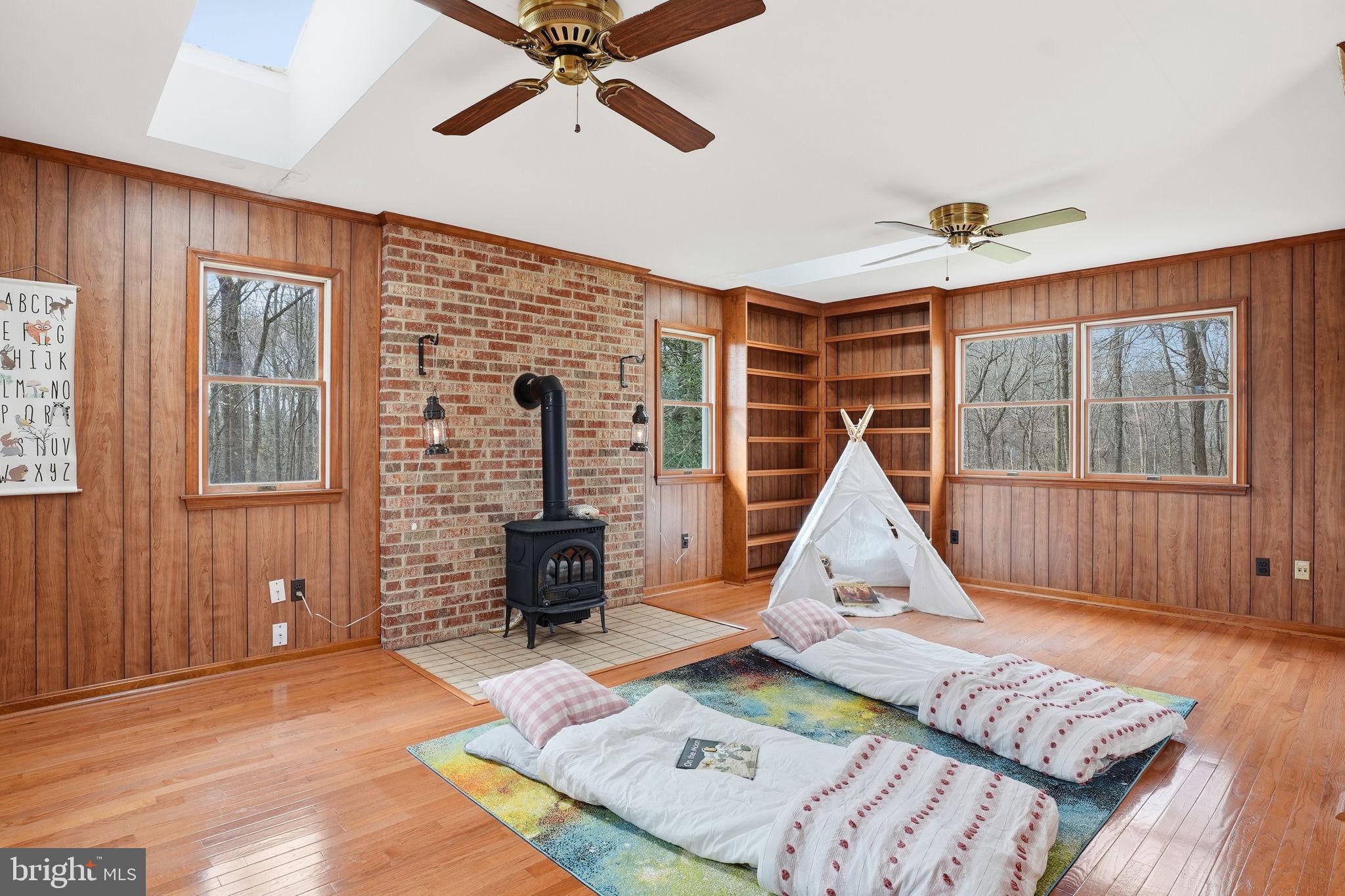 18311 Queen Anne Bridge Road Bowie, MD 20716 - Photo 32 of 46 a living room with furniture and wooden floor