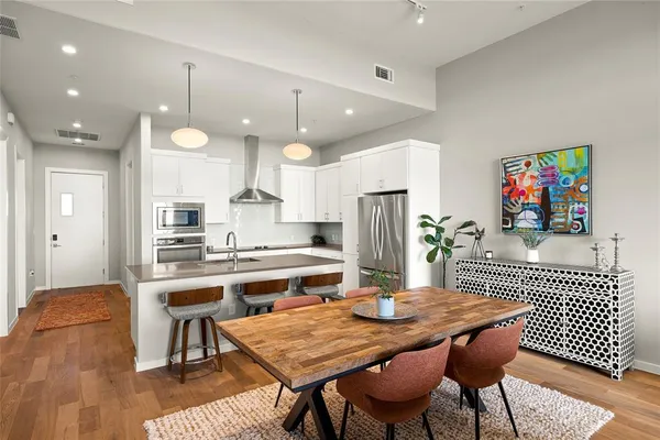 a view of a dining room with furniture