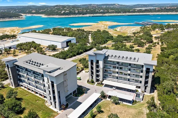 an aerial view of a house with a ocean view