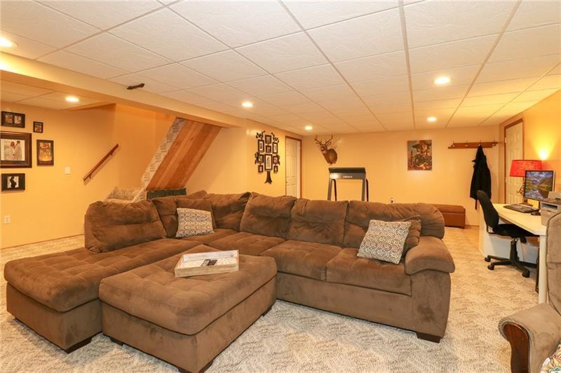 120 Goldscheitter Road Sarver, PA 16055 - Photo 16 of 20 THE GAME ROOM HAS A LARGE CLOSET, GAS HEATER, AND ACCESS TO THE GARAGE (DOOR ON THE RIGHT OF PHOTO).