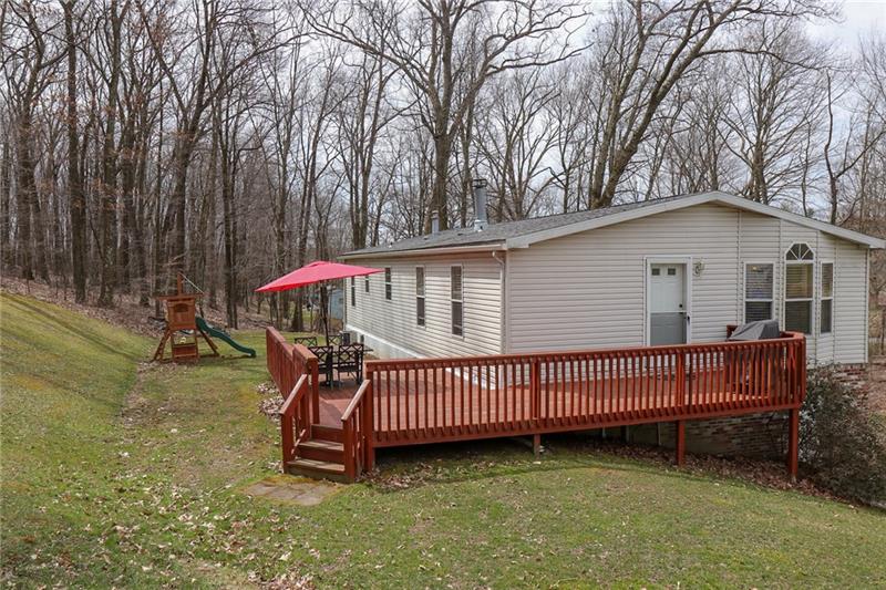 120 Goldscheitter Road Sarver, PA 16055 - Photo 18 of 20 THE SIDE AND REAR PORCH WITH ACCESS FROM THE KITCHEN VIA THE LAUNDRY/MUD ROOM.
