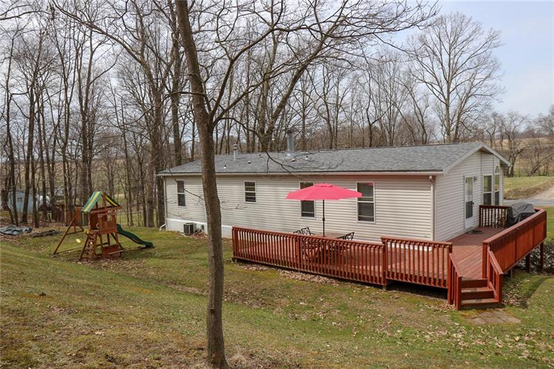 120 Goldscheitter Road Sarver, PA 16055 - Photo 20 of 20 THE REAR OF THE HOME...THE PROPERTY EXTENDS INTO BOTH THE SIDE AND REAR WOODS.