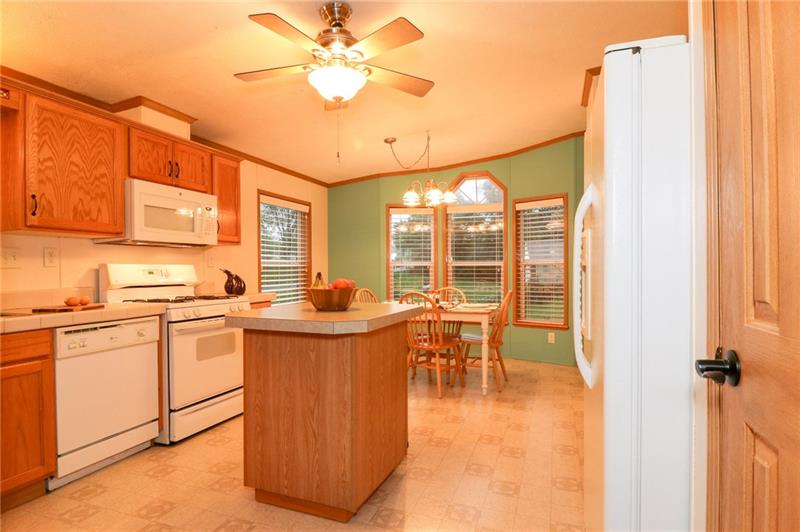 120 Goldscheitter Road Sarver, PA 16055 - Photo 6 of 20 THE KITCHEN FEATURES LOADS OF CABINETS AND PANTRY TO MANAGE ALL OF YOUR STORAGE NEEDS, AN ISLAND FOR CONVENIENT MEAL PREP, PLENTY OF COUNTER SPACE, AND IS STEPS FROM THE LAUNDRY/MUDROOM.