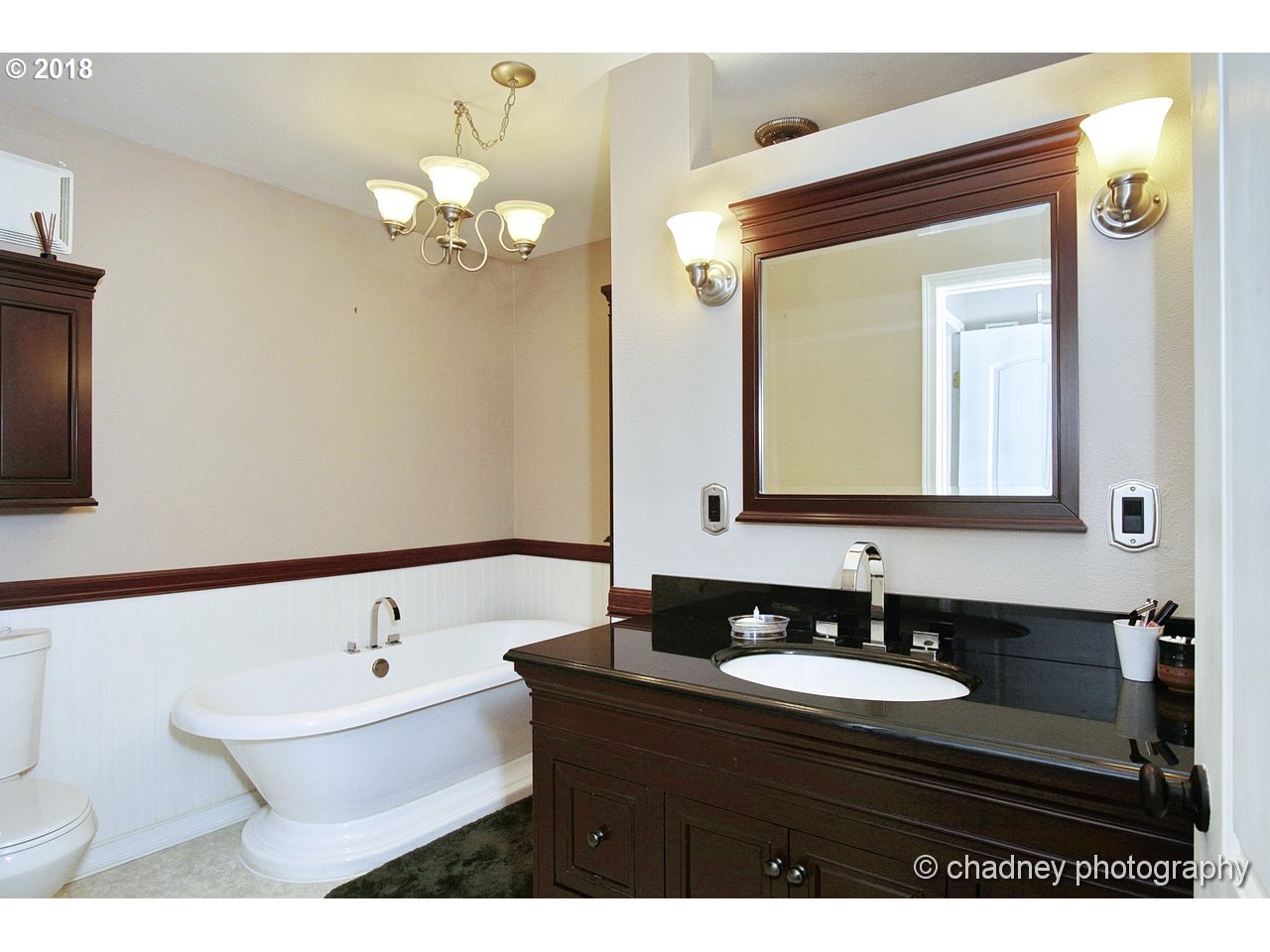 19971 Southeast Baty Road Sandy, OR 97055 - Photo 14 of 32 a bathroom with a double vanity sink and a mirror