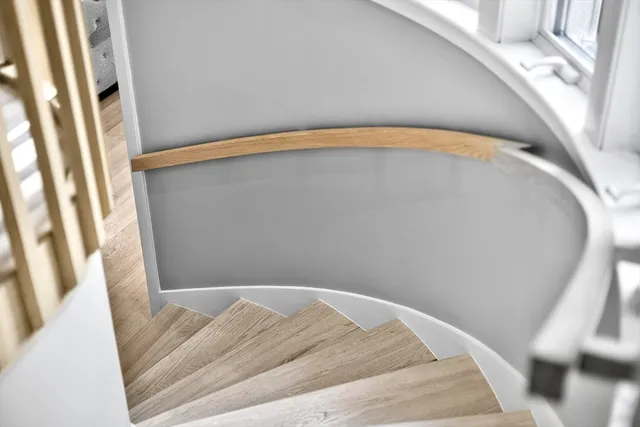 a bedroom with a large bed and a couch