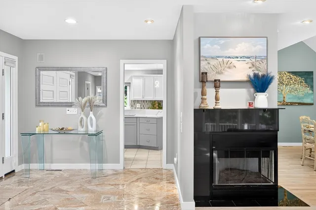 a kitchen with a stove a sink and a refrigerator