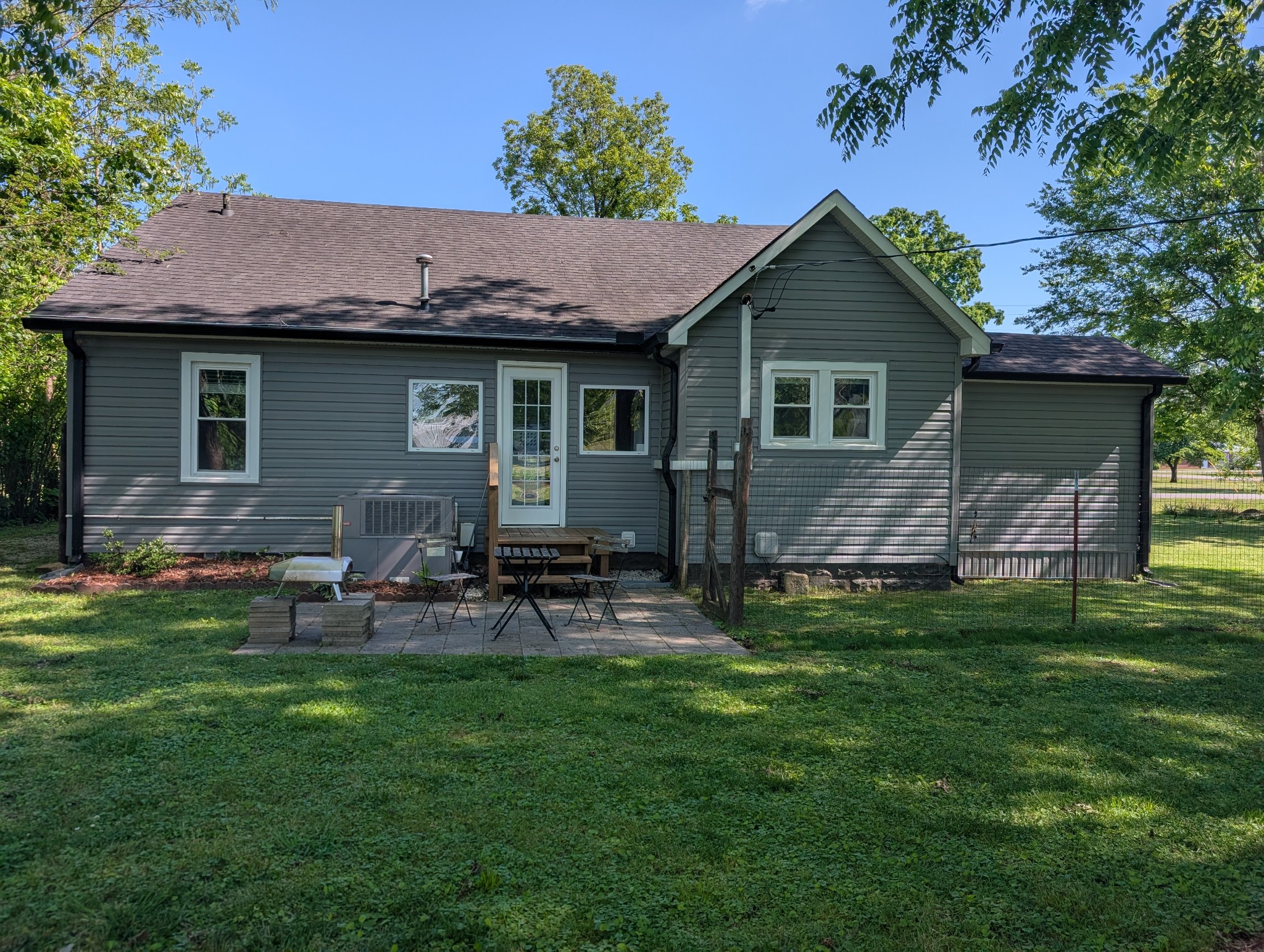 905 Nicholson Street Decherd, TN 37324 - Photo 26 of 27 a front view of house with yard and outdoor seating