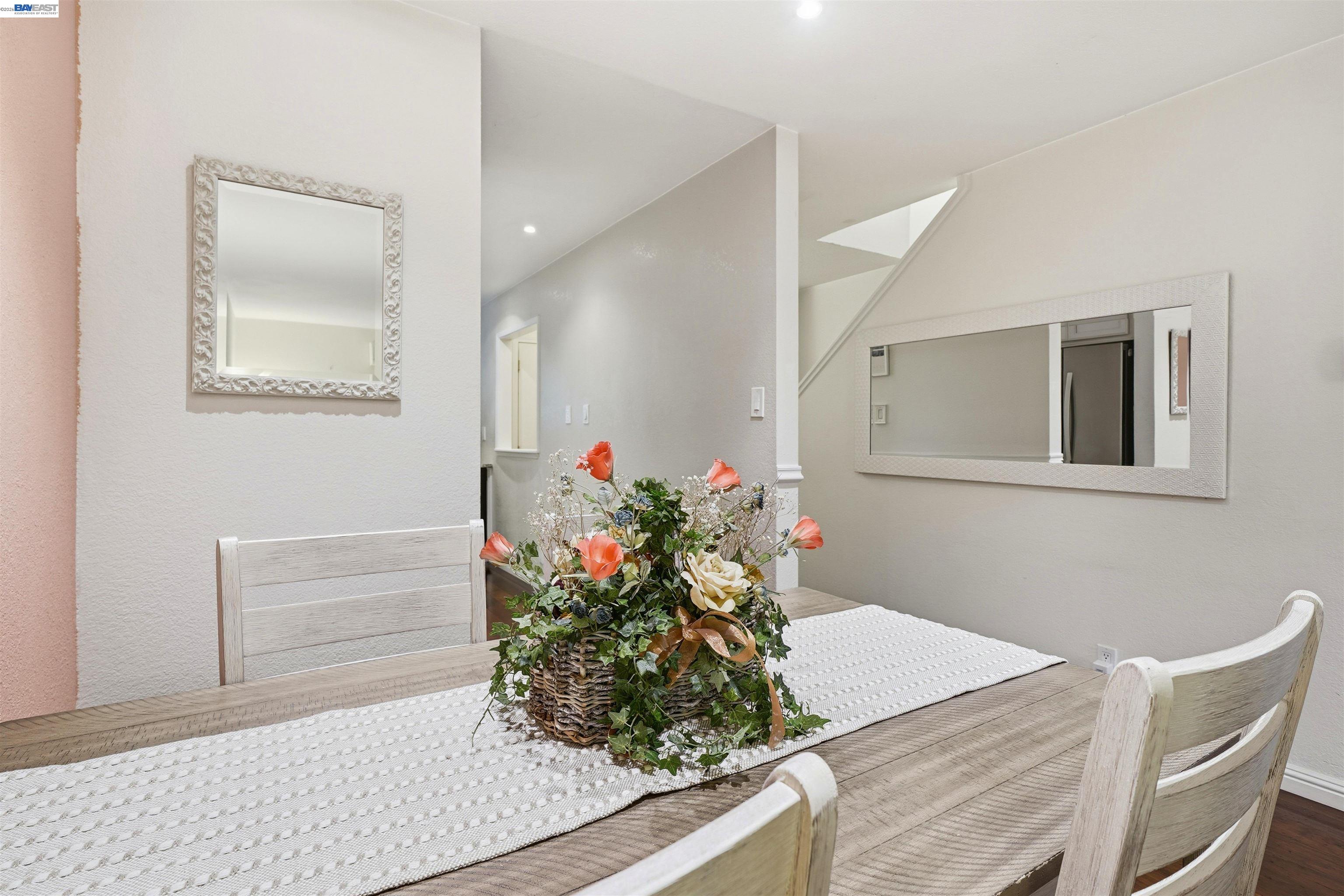 8985 Alcosta Boulevard, Unit 162 San Ramon, CA 94583 - Photo 22 of 33 a room with a table and chairs