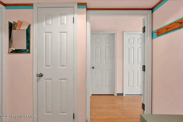 a bedroom with bed and a window