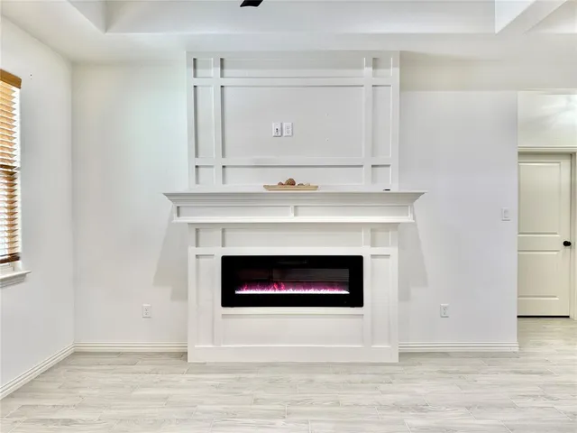 a living room with a fireplace