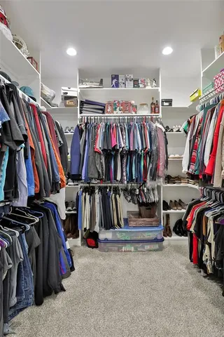 a view of staircase with white walls