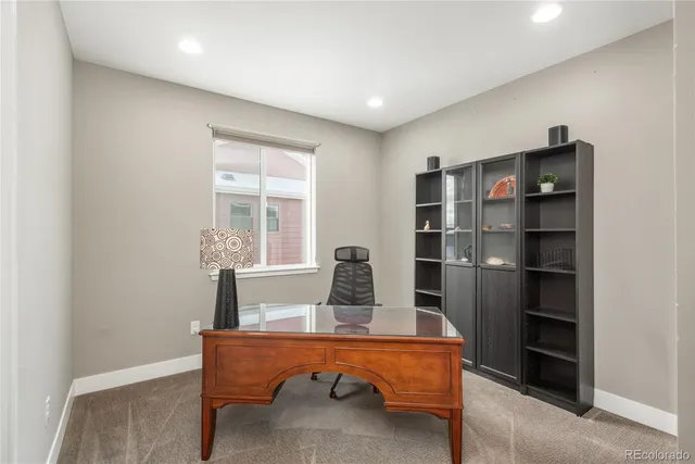 a room with a table and a window