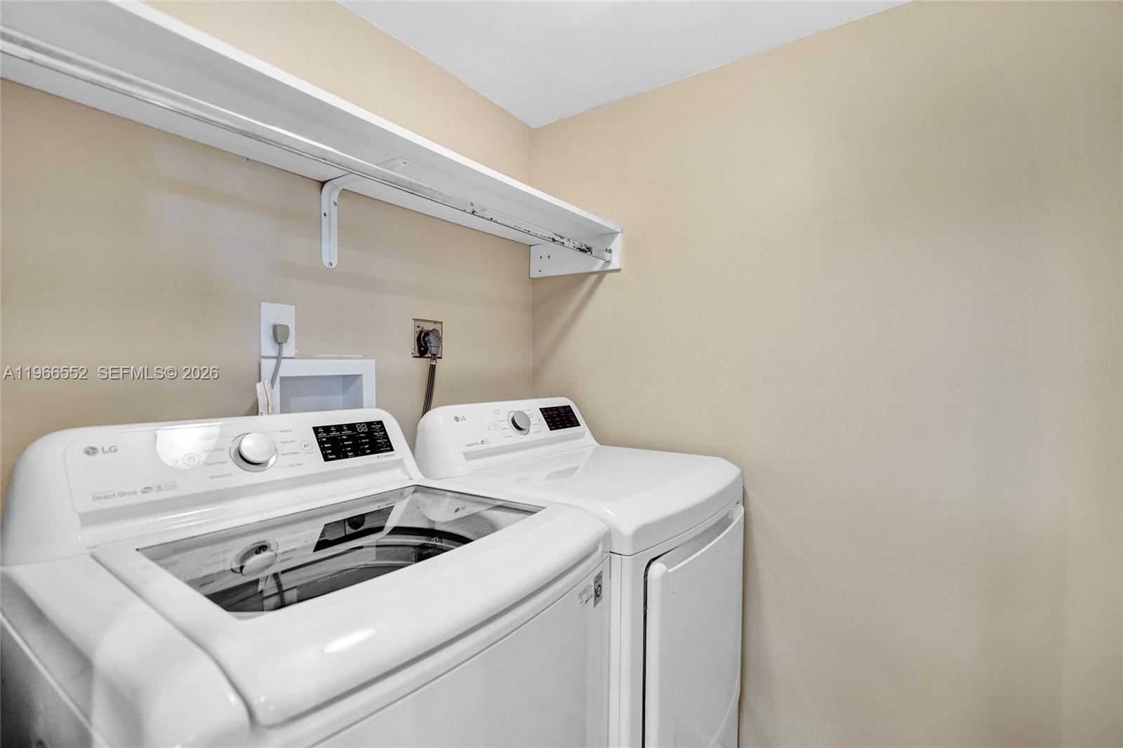 14475 Strathmore Lane, Unit 406 Delray Beach, FL 33446 - Photo 21 of 29 In Unit Laundry