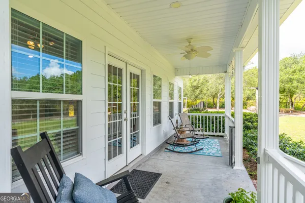 a view of a room with a large window