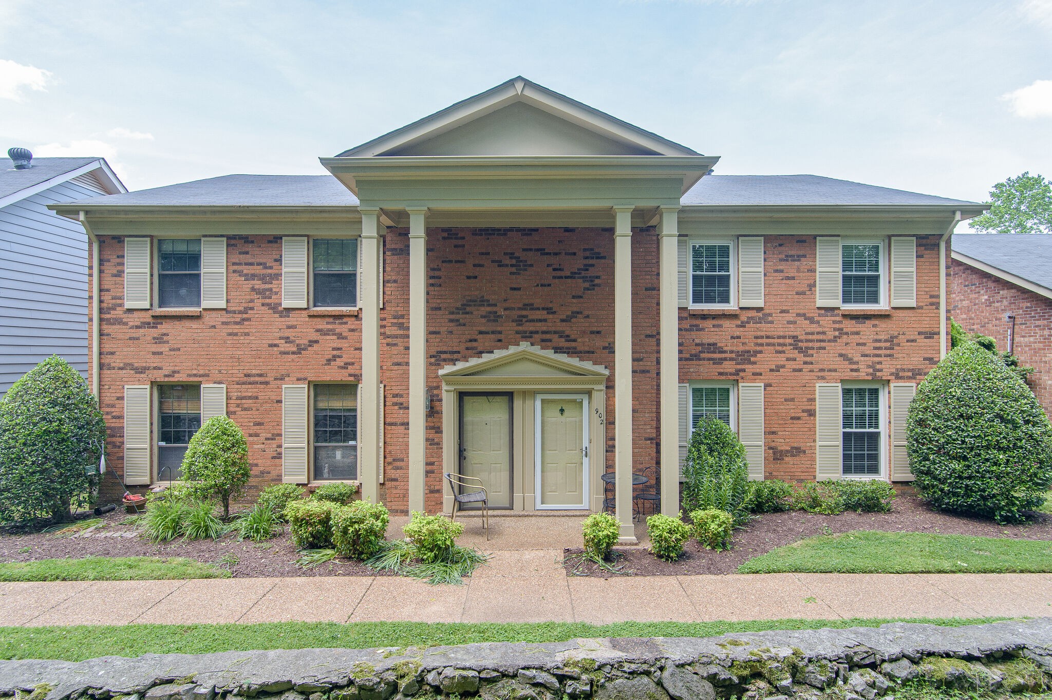 902 General George Patton Road Nashville, TN 37221 - Photo 1 of 22 front view of brick house with a yard