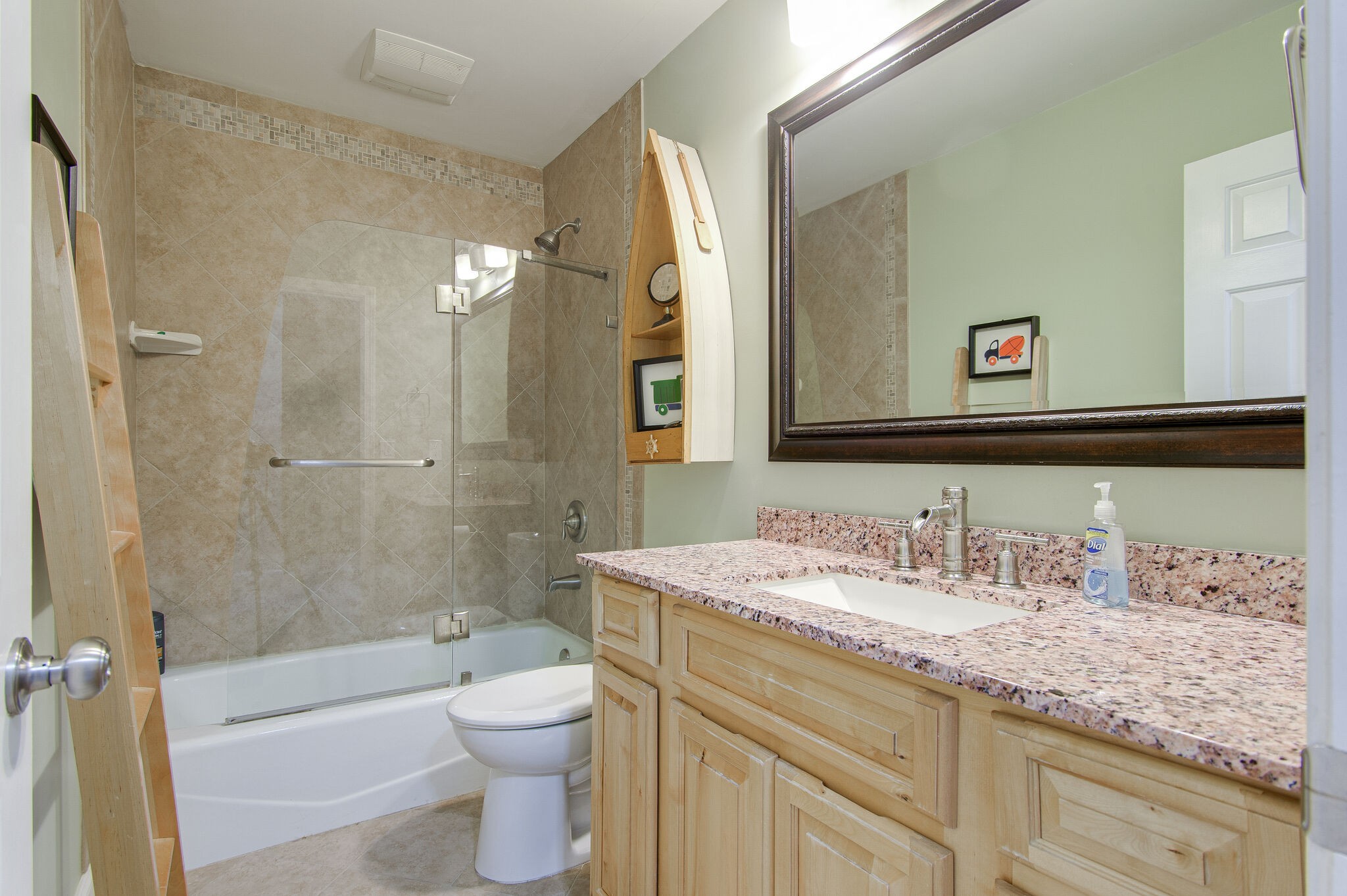 902 General George Patton Road Nashville, TN 37221 - Photo 19 of 22 a bathroom with a granite countertop sink toilet and shower