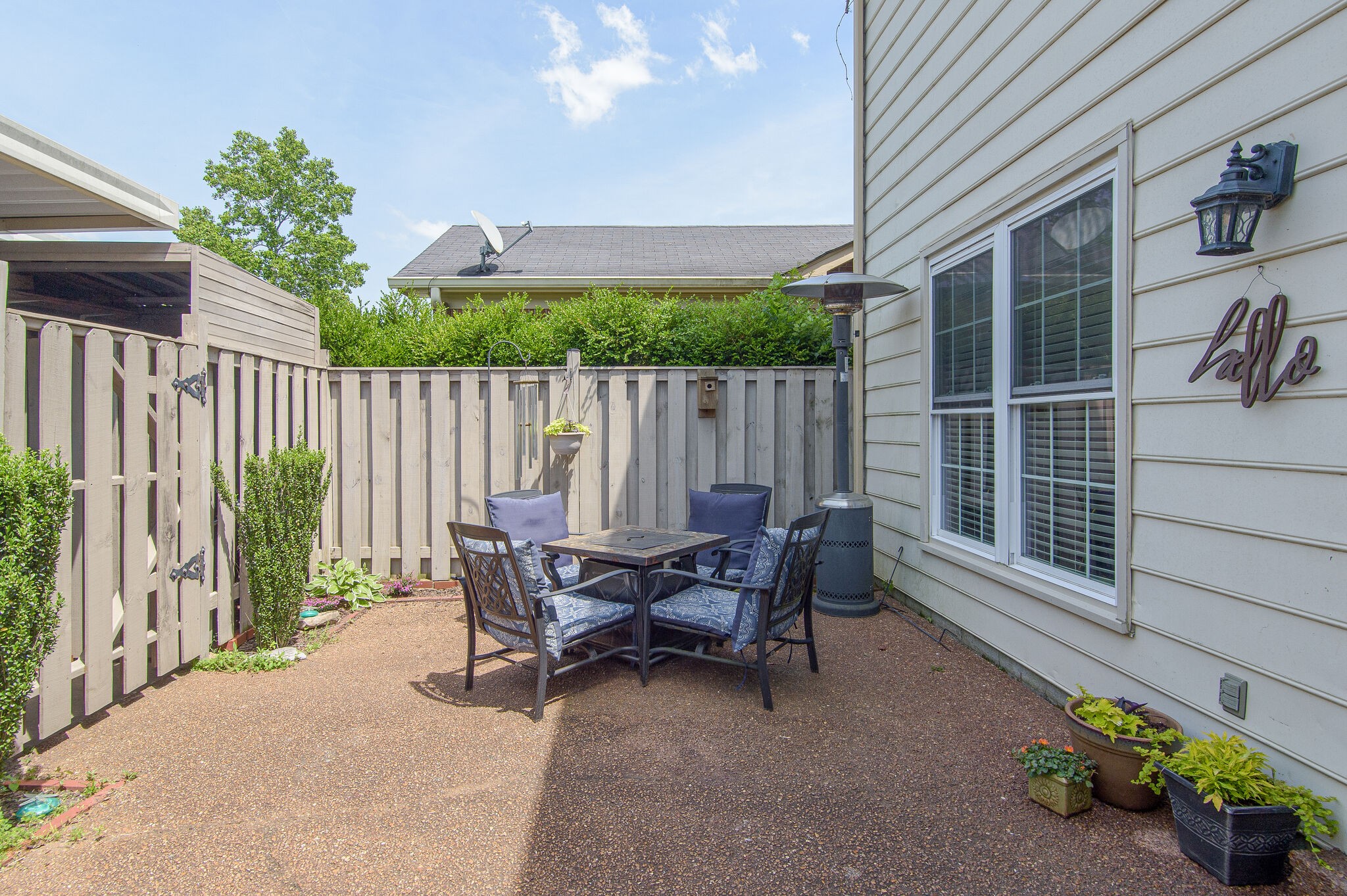 902 General George Patton Road Nashville, TN 37221 - Photo 22 of 22 a view of a patio with a table and chairs