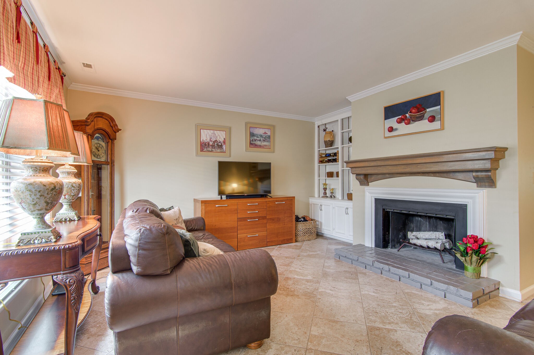 902 General George Patton Road Nashville, TN 37221 - Photo 5 of 22 a living room with furniture and a fireplace