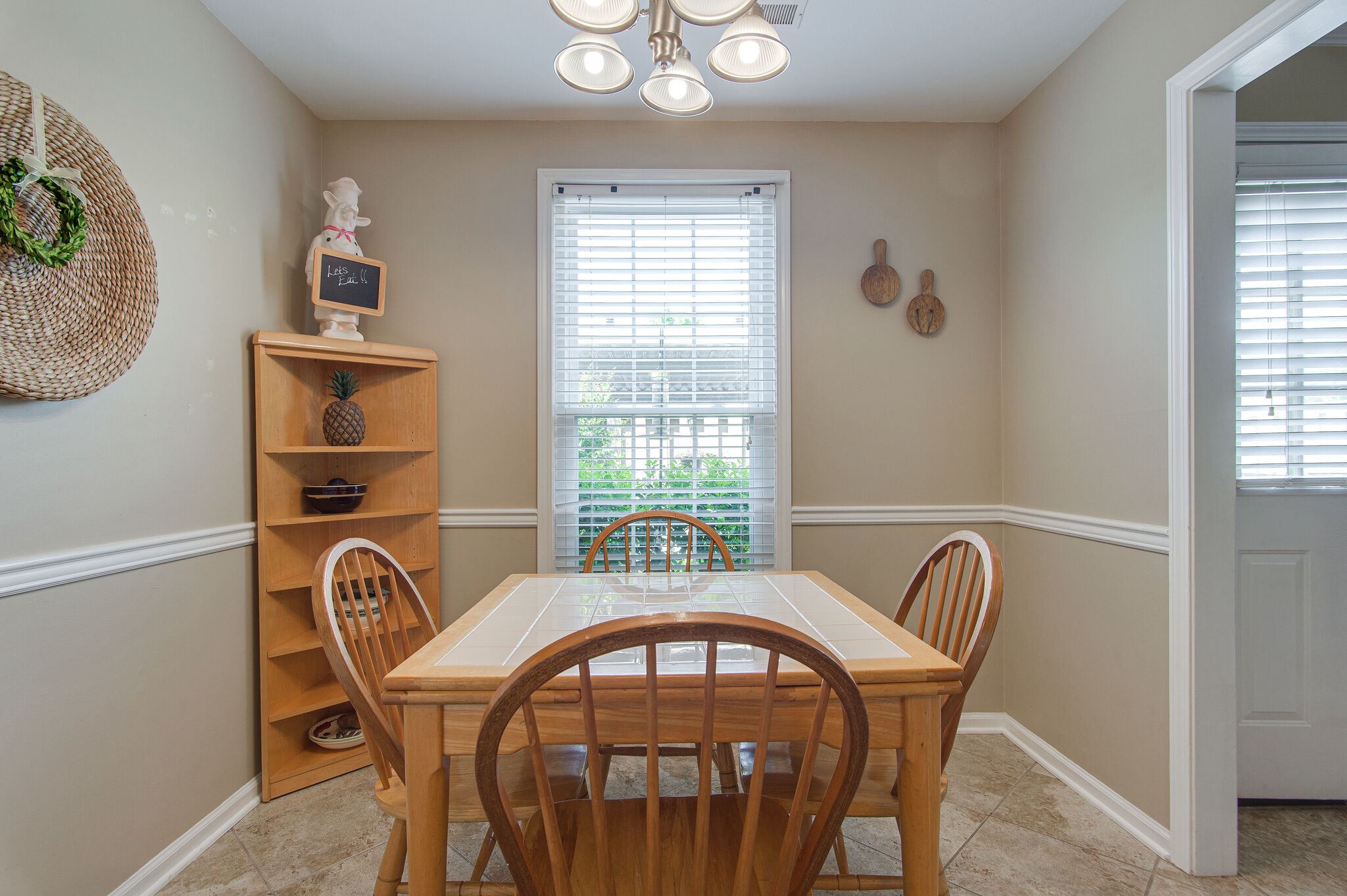 902 General George Patton Road Nashville, TN 37221 - Photo 8 of 22 a view of a dining room with furniture and a window