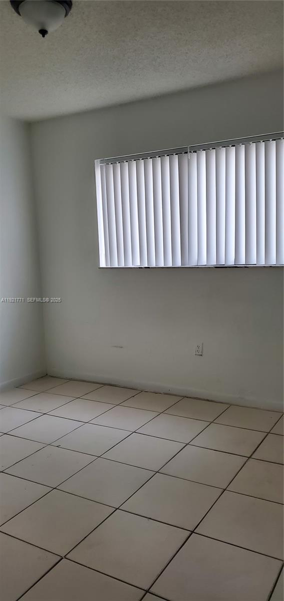 5702 West 26th Avenue, Unit 5702 Hialeah, FL 33016 - Photo 7 of 10 a view of a garage