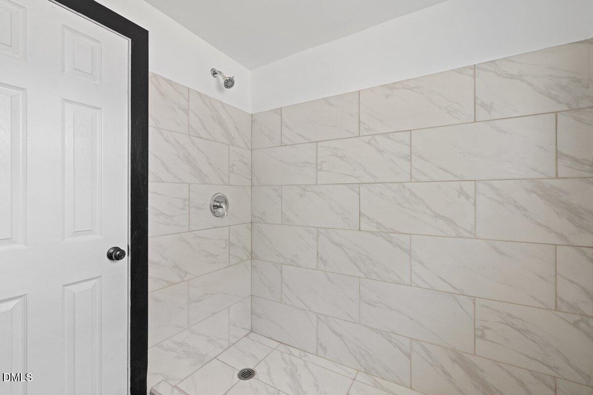 601 Temple Street Selma, NC 27576 - Photo 8 of 13 a bathroom with a shower