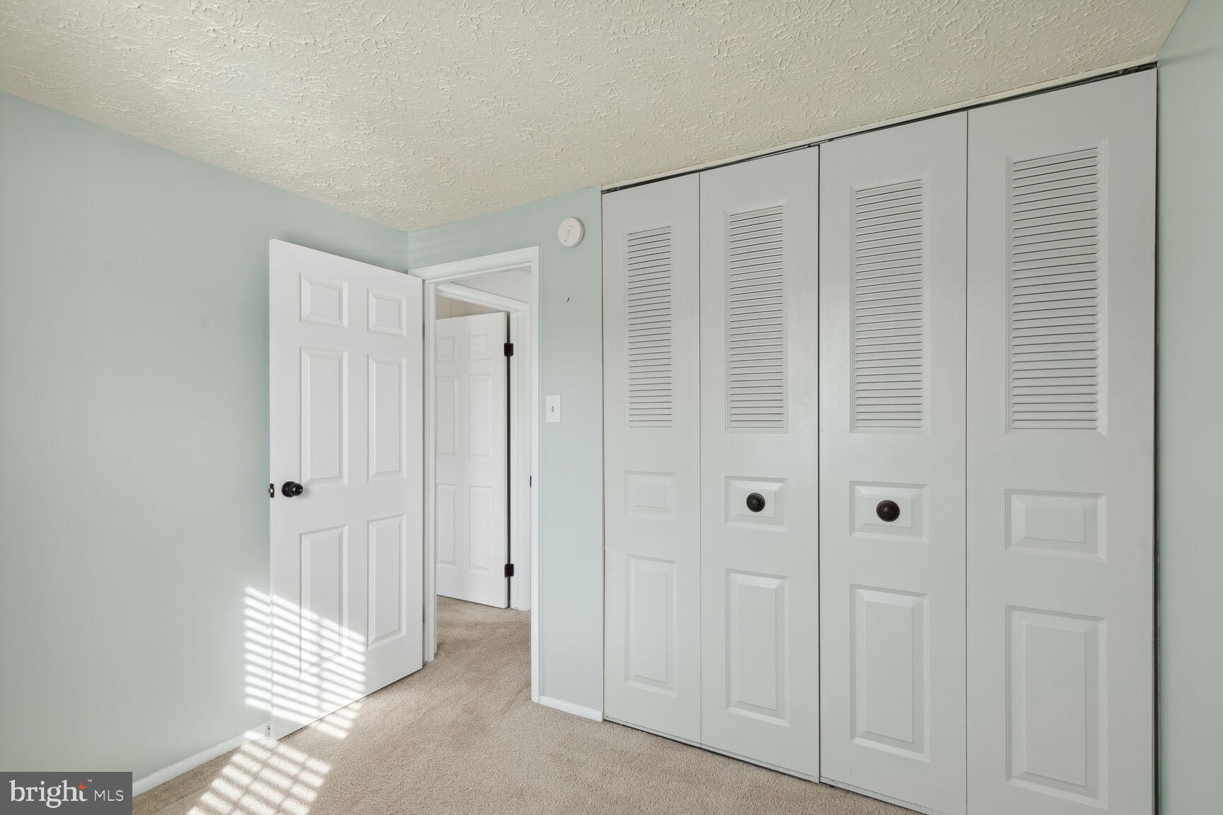 25636 Coltrane Drive Damascus, MD 20872 - Photo 13 of 26 a view of a bathroom with a shower