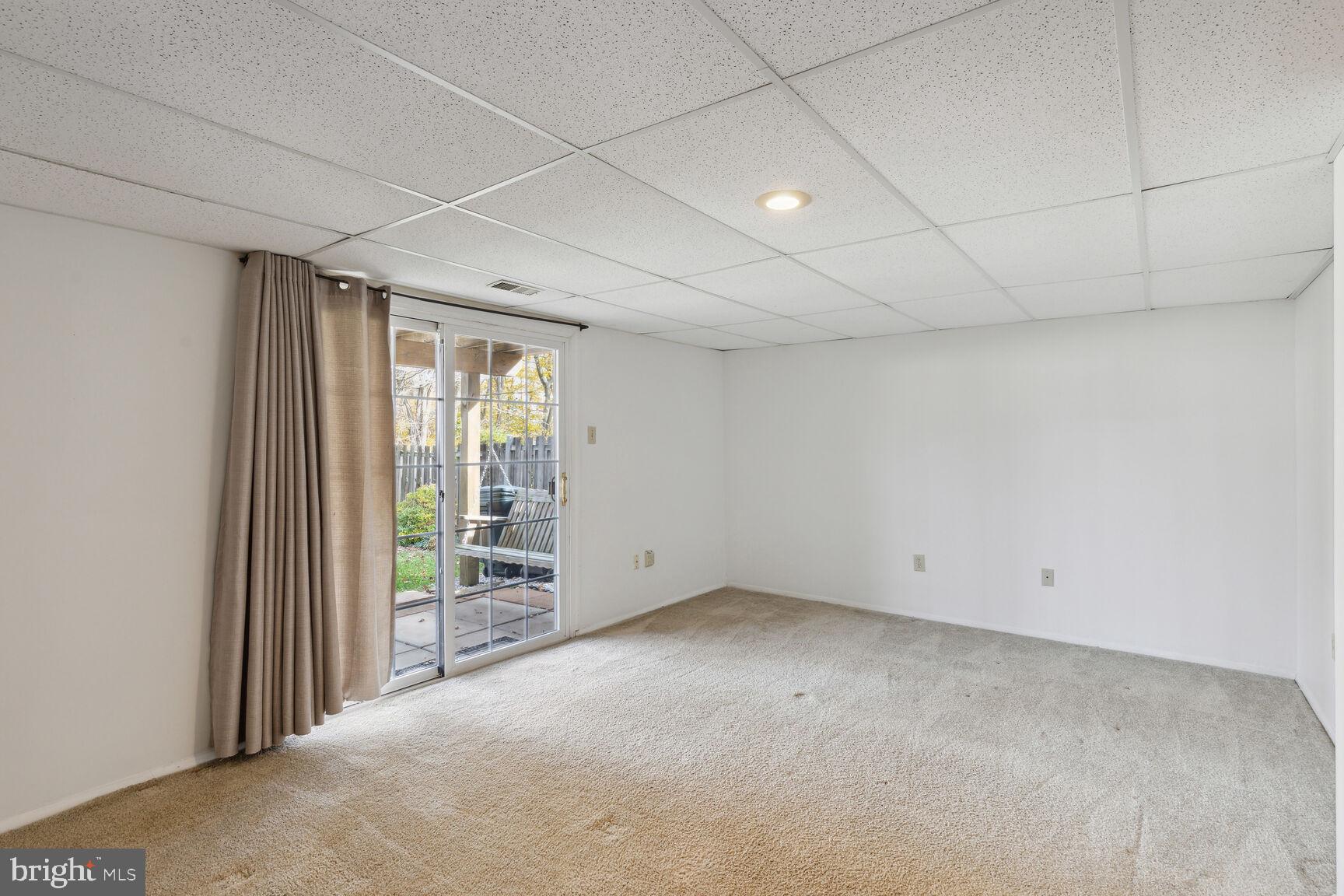 25636 Coltrane Drive Damascus, MD 20872 - Photo 14 of 26 a view of an empty room with a window